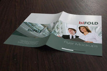 Load image into Gallery viewer, Free Bifold Flyer Mockup
